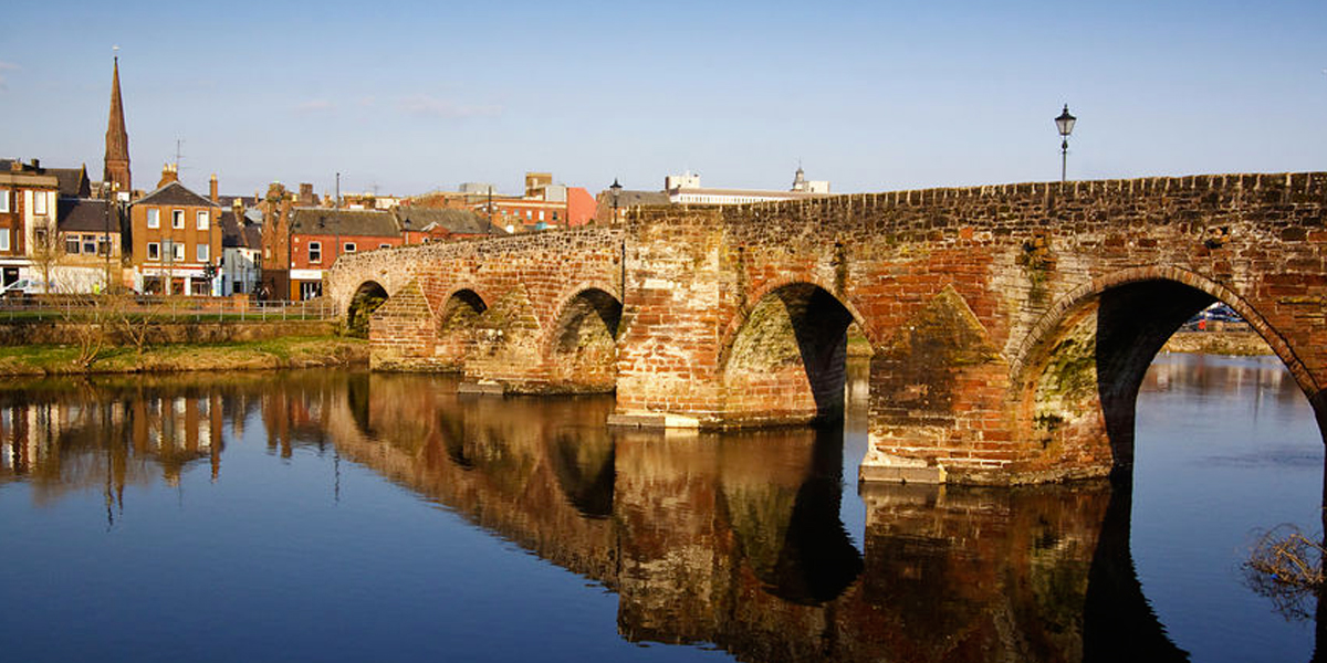 Photo of a bridge crossing the river in Dumfries
